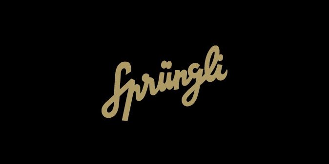 The Confiserie Sprüngli logo on a black background.
