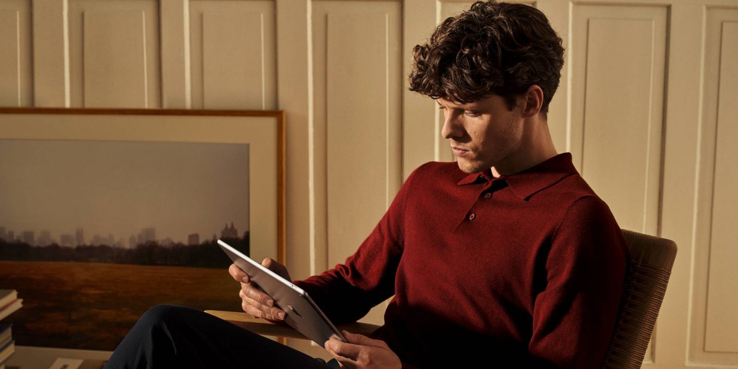 Relaxing with a tablet. Perfect for your journey.